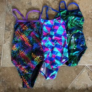 Competitive swim practice suits.  NIKE & DOLFIN